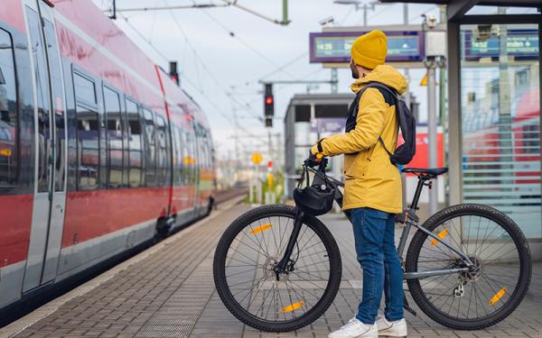 Stock photo - sustainable transportation, bicycle and train