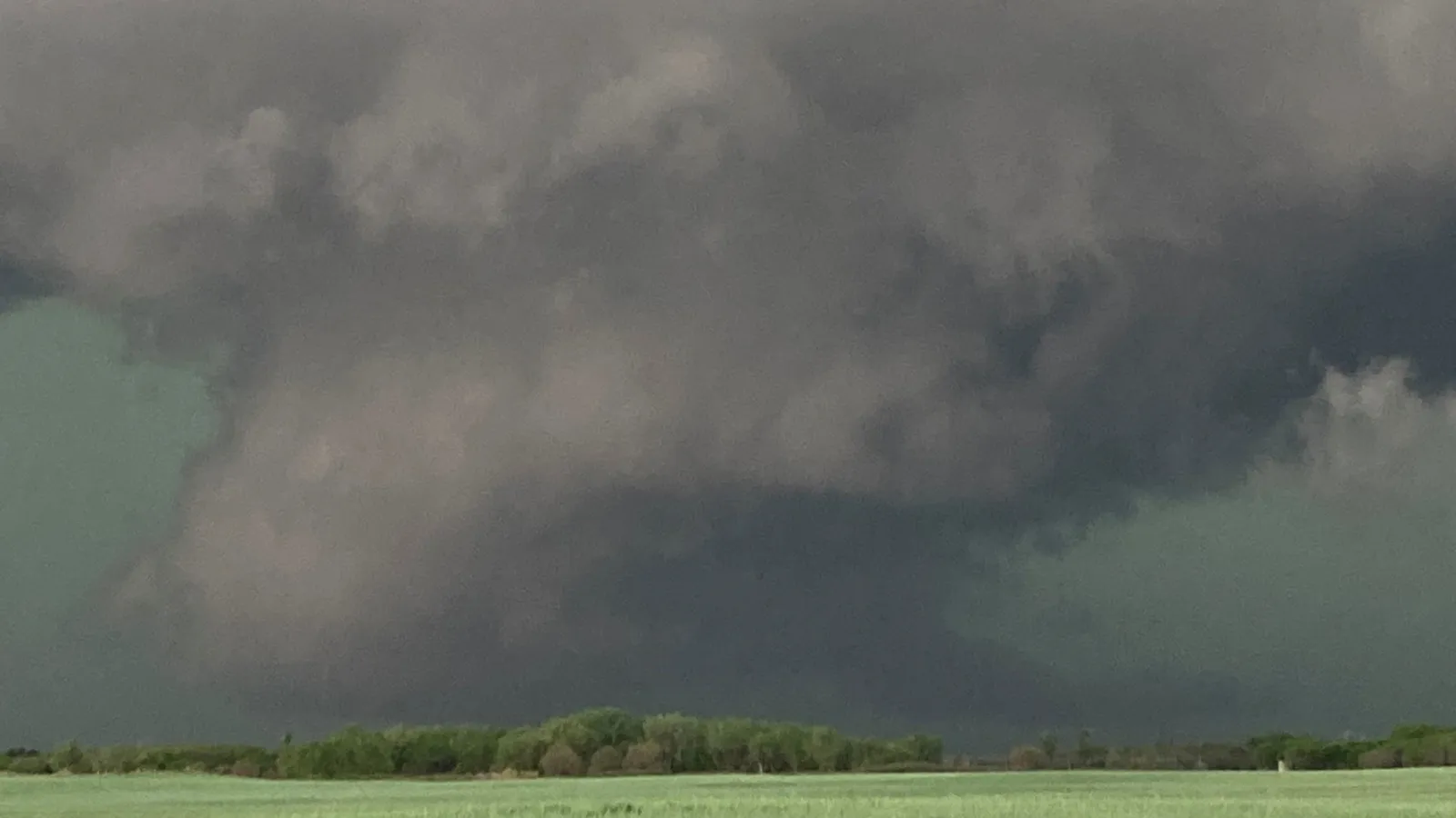 A low-hanging wall cloud on a supercell in Western KS on 5/9. (Photo credit: Jana Houser)
