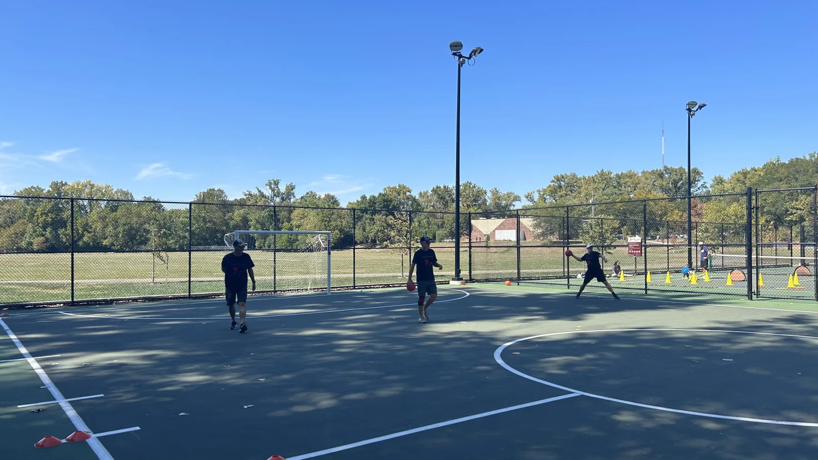 Faculty members playing dodgeball
