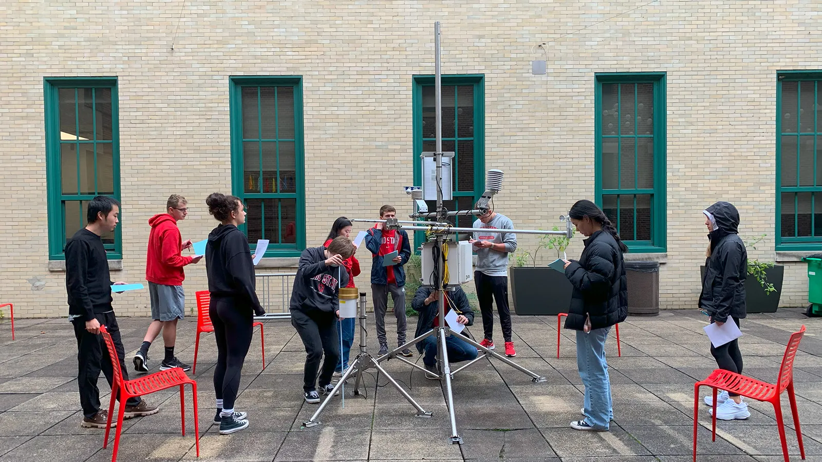 Students assembling instrumentation in Derby Hall atrium