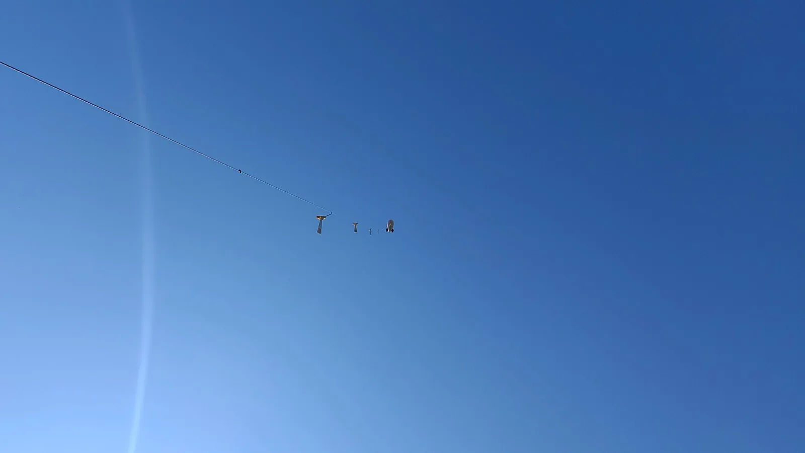 Blimp flying high over the Oval