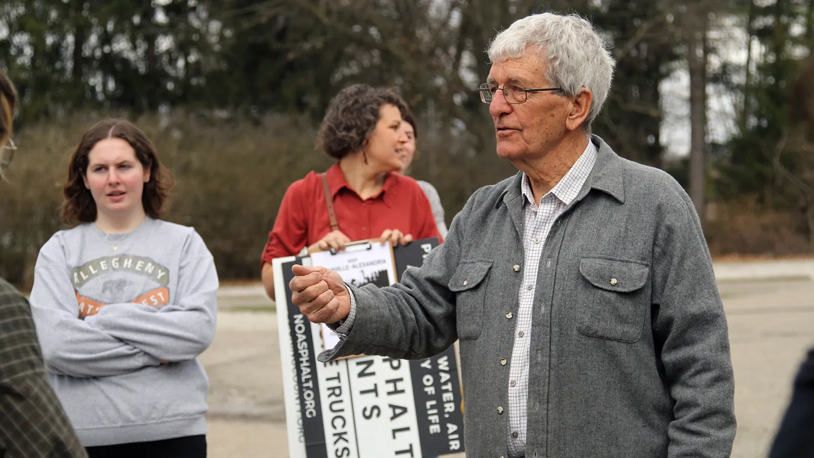 Photo of Ken Apacki talking to Ohio State students in the village of Alexandria, OH