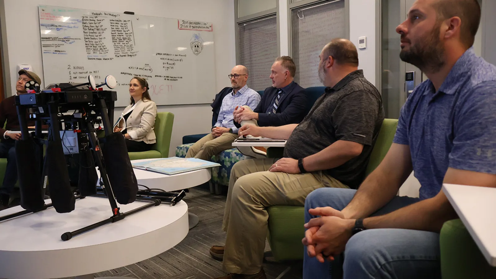 Adam Sauer, Kendra McSweeney, Bryan Mark, Mat Coleman, Kelby Thoreson, & Bryan Hanft listen to Adam Tjoelker's presentation