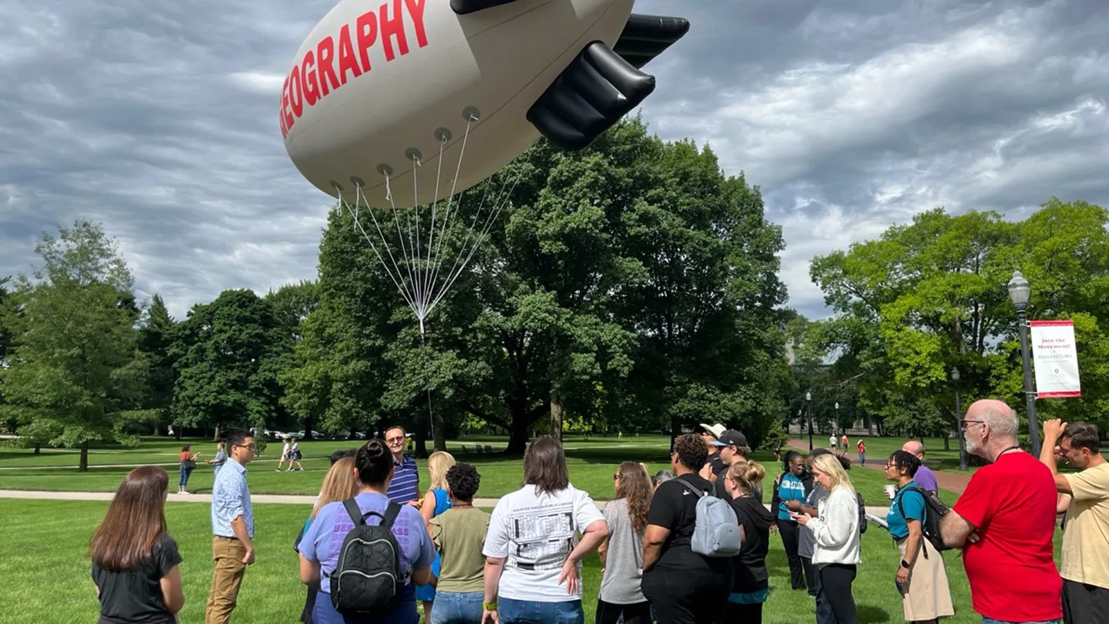 Geography blimp with STEAMM teachers on the Oval