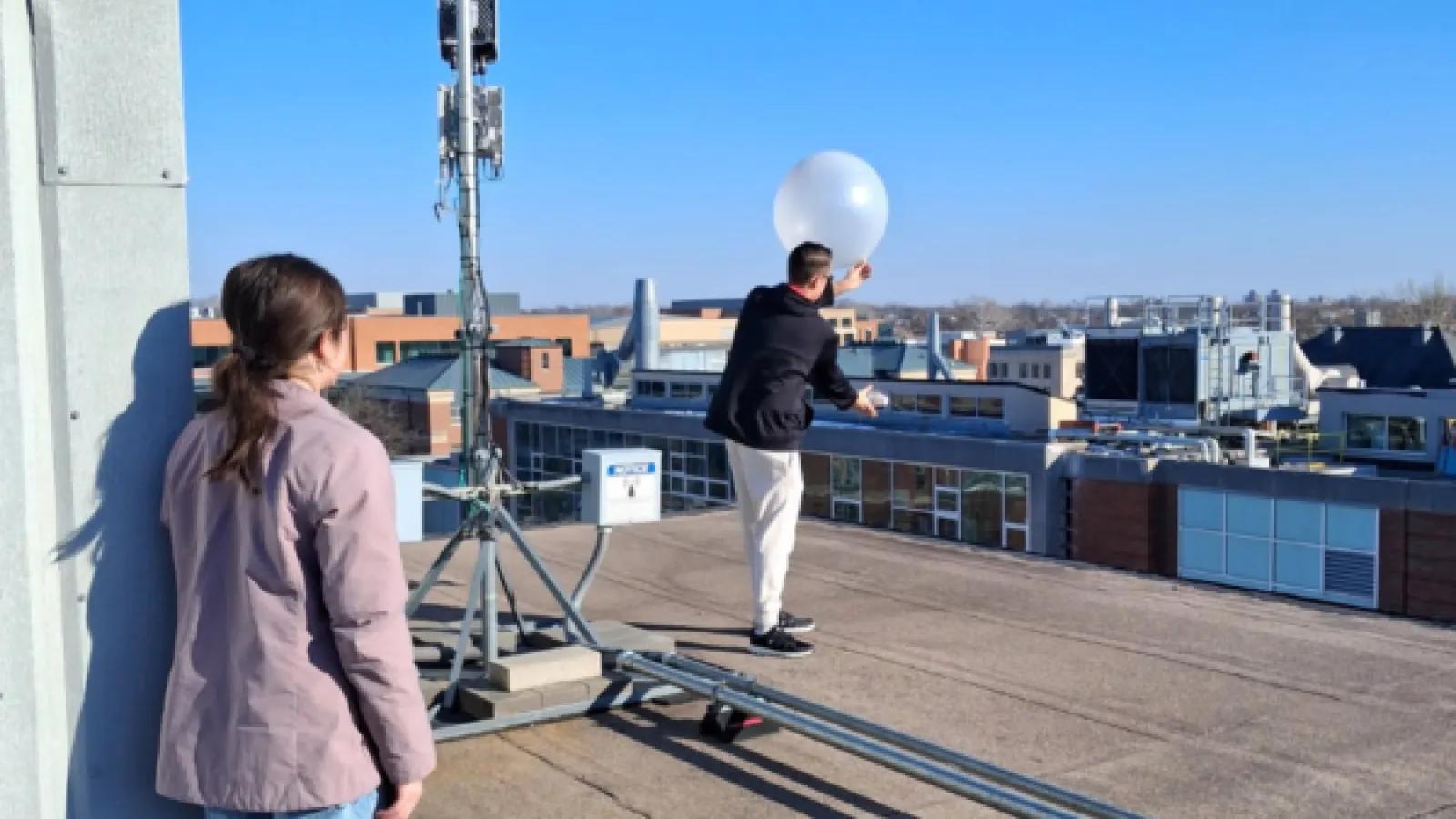 Students conducting weather balloon experiments