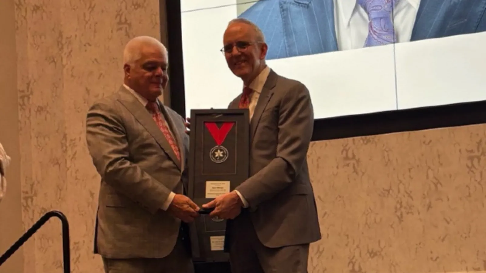 Gary Sharpe receiving an Award