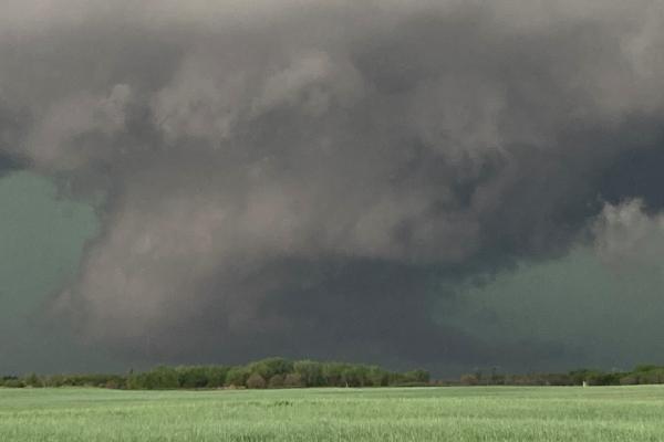 A low-hanging wall cloud on a supercell in Western KS on 5/9. (Photo credit: Jana Houser)