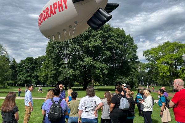 Geography blimp with STEAMM teachers on the Oval