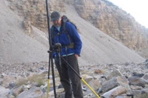 Jim DeGrand checking GPS station