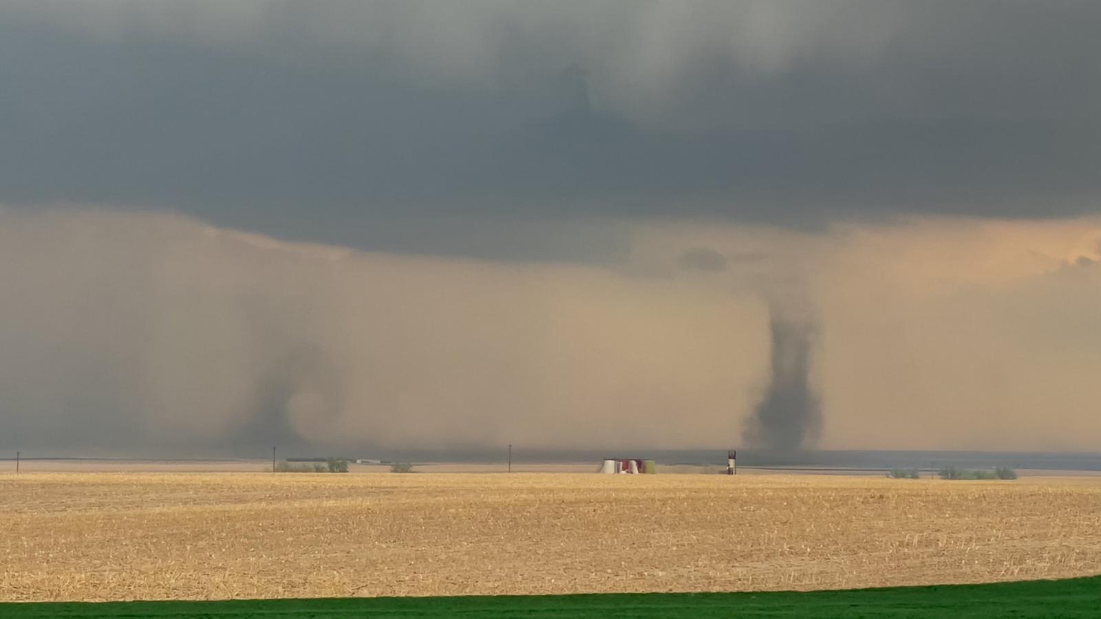 Land spout tornado and near-ground horizontal roll east of Denver, CO (photo credit Greg Robbin)