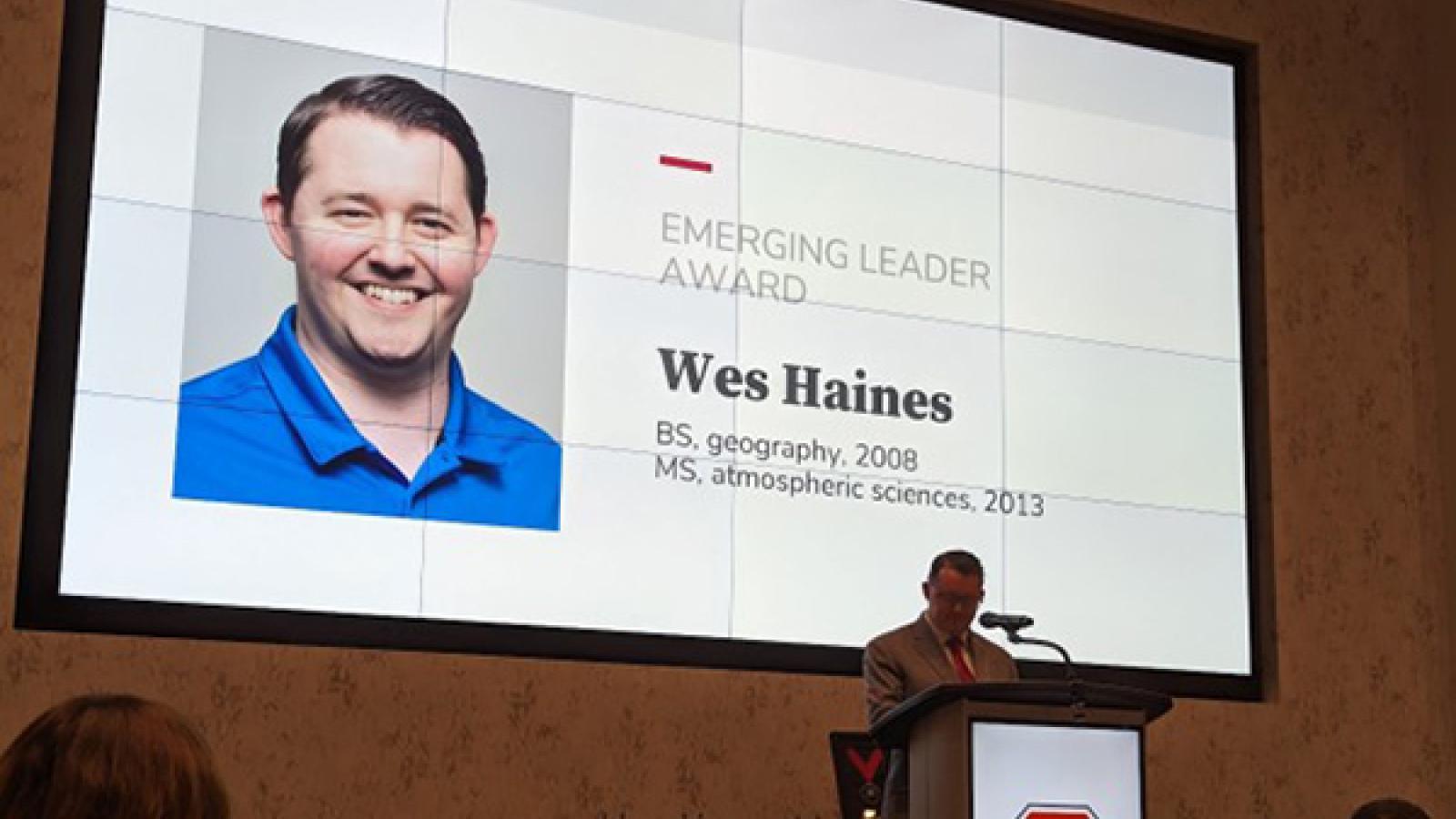 Photo of Wes Haines receiving Emerging Leader Award