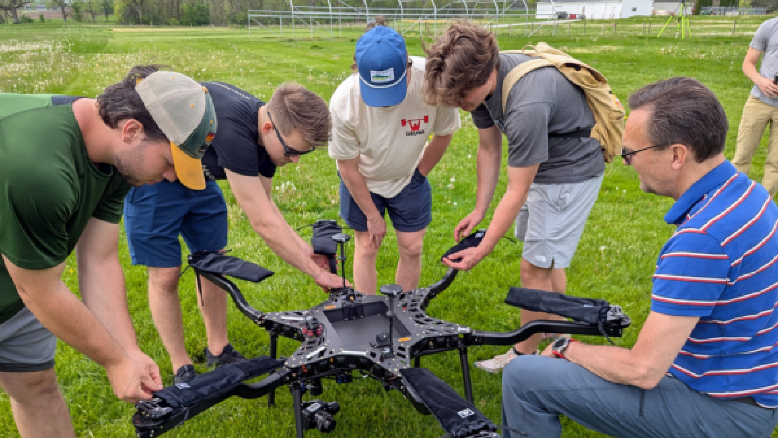 Jens Blegvad with undergraduate students with drone equipment