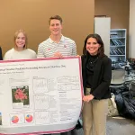 Sam Porter, Megan Shaffer, Daniel Baltes, Annie Giovannucci with their poster