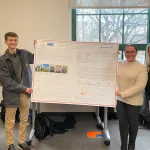 Blake Murray, Ethan Hersey, Emma Edwardson, and Erika Mrazik with their poster