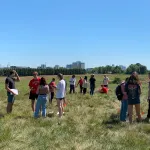 Students setting up field data equipment