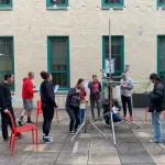 Students assembling instrumentation in Derby Hall atrium
