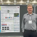 Jacob Fields with his poster at AMS