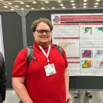 Joshua Steiner with his poster at AMS