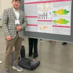 Zhanassyl Teleubay with his poster
