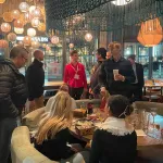Students at social event during AMS