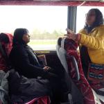 Dr. Madhumita Dutta talking to students on bus