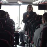 Dawn Burton talking to students on bus